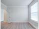 Bedroom features laminate flooring, one window, and neutral paint at 3022 Burnello Ct, Iron Station, NC 28080