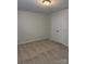 Neutral bedroom featuring carpeted floors and a closet for optimal storage at 3022 Burnello Ct, Iron Station, NC 28080