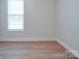 Bedroom features laminate flooring and one window at 3022 Burnello Ct, Iron Station, NC 28080