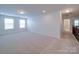 Spacious bonus room with neutral carpet, recessed lighting, and two large windows at 3022 Burnello Ct, Iron Station, NC 28080