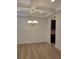 Formal dining room with elegant lighting and classic trim at 3022 Burnello Ct, Iron Station, NC 28080