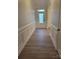 Bright foyer with decorative front door and traditional wainscoting at 3022 Burnello Ct, Iron Station, NC 28080