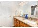 This bathroom features dual sinks, granite countertops, and wood cabinetry at 3049 Stablegate Dr, Gastonia, NC 28052