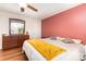 A charming bedroom features wood floors, natural light, and a ceiling fan at 3049 Stablegate Dr, Gastonia, NC 28052