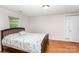 The bedroom features hardwood floors, natural light, and closet at 3049 Stablegate Dr, Gastonia, NC 28052