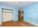 A bedroom featuring defaced walls, hardwood floors, and a closet at 3316 Fairhaven Rd, Rock Hill, SC 29732