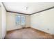 A bedroom featuring damaged drywall, wallpaper, and hardwood floors at 3316 Fairhaven Rd, Rock Hill, SC 29732