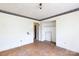 Bedroom featuring plywood flooring and a closet offering a simple layout ready for renovation and customization at 3316 Fairhaven Rd, Rock Hill, SC 29732