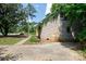 Side view of a brick single Gathering house with mature trees on a sunny day at 3316 Fairhaven Rd, Rock Hill, SC 29732