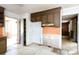 Outdated kitchen, with a open doorway and orange backsplash at 3316 Fairhaven Rd, Rock Hill, SC 29732