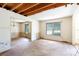 Spacious living room with exposed ceiling, hardwood floors, and double-hung windows at 3316 Fairhaven Rd, Rock Hill, SC 29732