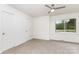 Bright bedroom with carpeted floors, neutral paint, and ceiling fan at 3555 Tree Line Dr, Rock Hill, SC 29732