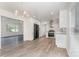 Spacious, renovated kitchen with stainless steel appliances adjacent to a bright living area at 3555 Tree Line Dr, Rock Hill, SC 29732