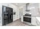 A modern kitchen features stainless steel appliances and ample cabinet space at 3555 Tree Line Dr, Rock Hill, SC 29732