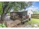 Backyard featuring a deck, trees, and a pathway at 403 Carpenter Parker Ln, Rock Hill, SC 29730