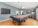 Large game room featuring a pool table and hardwood floors at 403 Carpenter Parker Ln, Rock Hill, SC 29730