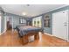Large game room featuring a pool table and hardwood floors at 403 Carpenter Parker Ln, Rock Hill, SC 29730