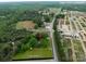 Aerial view of a home with 1.05 acres of land, and a commercial Bedroom next door at 4098 S Nc Hwy 127 Hwy, Hickory, NC 28602