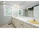 Spacious bathroom featuring an extended white countertop, double sinks and large mirror at 4098 S Nc Hwy 127 Hwy, Hickory, NC 28602