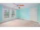Bedroom with large windows and vintage ceiling fan at 4098 S Nc Hwy 127 Hwy, Hickory, NC 28602