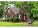 Charming brick home with mature trees and well-maintained landscaping at 4098 S Nc Hwy 127 Hwy, Hickory, NC 28602