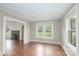 Bright living room features hardwood floors, a fireplace, and ample natural light at 4098 S Nc Hwy 127 Hwy, Hickory, NC 28602