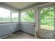 Cozy sunroom with natural light and exterior access at 4098 S Nc Hwy 127 Hwy, Hickory, NC 28602