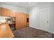 Murphy bed in a room with custom built ins and desk at 411 Steel Gardens Blvd, Charlotte, NC 28205