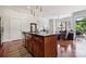 Lovely kitchen with stainless appliances, granite counters and an island with seating at 411 Steel Gardens Blvd, Charlotte, NC 28205