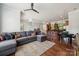 Open floor plan with a spacious living room, kitchen island, and dining area at 411 Steel Gardens Blvd, Charlotte, NC 28205