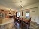 Eat-in dining area open to the kitchen with hard surface floors and natural light at 4111 Jenkins Rd, Marshville, NC 28103