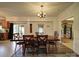 Inviting dining room with a wooden table, chandelier, and views of the backyard at 4111 Jenkins Rd, Marshville, NC 28103