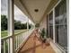 Comfortable front porch with rocking chairs provides a place to relax and enjoy the view at 4111 Jenkins Rd, Marshville, NC 28103