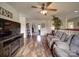 Spacious living room with wood floors, comfortable recliners, and an open floor plan at 4111 Jenkins Rd, Marshville, NC 28103