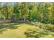 Well-maintained backyard enclosed by a black metal fence at 4116 Spring Cove Way, Belmont, NC 28012
