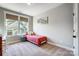 Bright bedroom with carpet flooring, featuring a large window providing ample natural light at 4116 Spring Cove Way, Belmont, NC 28012