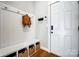 Mudroom with storage bench, hooks, and baskets, perfect for organization at 4116 Spring Cove Way, Belmont, NC 28012