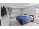 Comfortable bedroom with neutral decor, a nice size window, and room to relax and unwind at 4531 Dalbeth St, Charlotte, NC 28213
