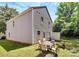 Backyard of the home features outdoor seating on a patio and a storage shed at 459 Presidents Ct, Charlotte, NC 28217