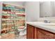 Cozy bathroom features a printed shower curtain, vanity with mirror, and tiled floors at 459 Presidents Ct, Charlotte, NC 28217