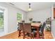 Bright dining area featuring a stylish table with comfortable seating and natural light, perfect for enjoying meals with Gathering at 459 Presidents Ct, Charlotte, NC 28217