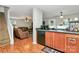 Functional kitchen, with black appliances, seamlessly connected to the living area at 459 Presidents Ct, Charlotte, NC 28217