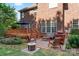 Charming backyard featuring a patio, fire pit, and lush landscaping perfect for outdoor entertaining at 4619 Glasgow Ct, Gastonia, NC 28056