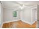 The spacious bedroom features hardwood floors, white trim and has a window for natural light and views at 500 Peigler Nw St # Lots 1 & 2, Concord, NC 28027