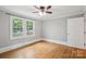 Bedroom with hardwood floors, natural light, and neutral paint at 500 Peigler Nw St # Lots 1 & 2, Concord, NC 28027
