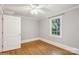 This bedroom boasts hardwood floors, neutral walls, and a bright window for a relaxing, inviting space at 500 Peigler Nw St # Lots 1 & 2, Concord, NC 28027