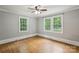 Light-filled bedroom with hardwood floors and two large windows offering natural light at 500 Peigler Nw St # Lots 1 & 2, Concord, NC 28027