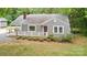 Well-maintained home featuring a beautifully landscaped yard and welcoming porch at 500 Peigler Nw St # Lots 1 & 2, Concord, NC 28027