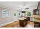 This updated kitchen features granite countertops, stainless steel appliances, and a functional center island at 500 Peigler Nw St # Lots 1 & 2, Concord, NC 28027