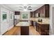 Well-lit kitchen features stainless steel appliances, granite countertops, and a convenient center island at 500 Peigler Nw St # Lots 1 & 2, Concord, NC 28027